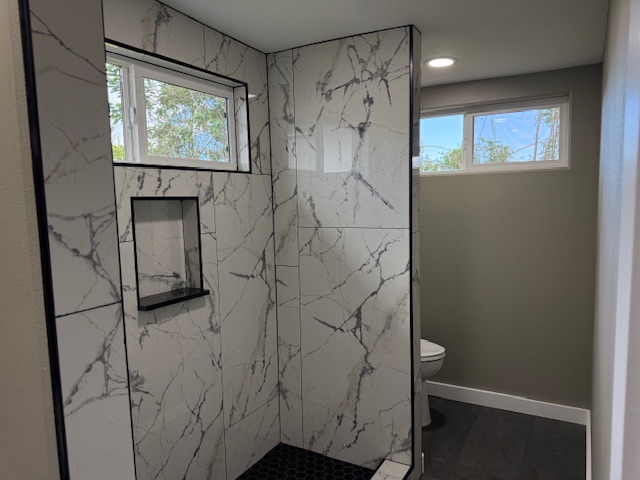 144 Chong Street Hilo, HI 96720 - Photo 21 of 28 a bathroom with a bathtub and shower