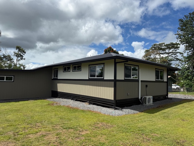 144 Chong Street Hilo, HI 96720 - Photo 25 of 28 a view of a house with a yard
