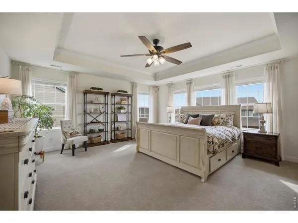 a bed room with furniture and a window