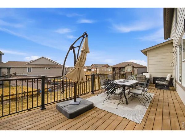 a view of roof deck with patio