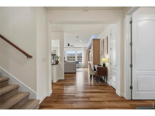 a view of a living room and entryway