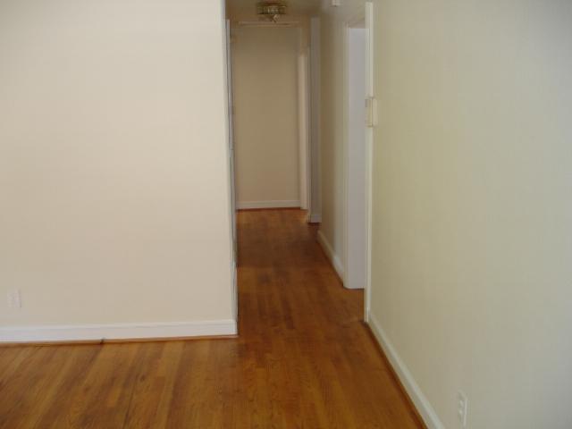 4429 Glenn Ridge Road Northwest Roanoke, VA 24017 - Photo 4 of 7 a view of a hallway with wooden floor