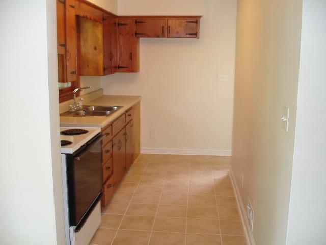 4429 Glenn Ridge Road Northwest Roanoke, VA 24017 - Photo 5 of 7 a kitchen with a stove