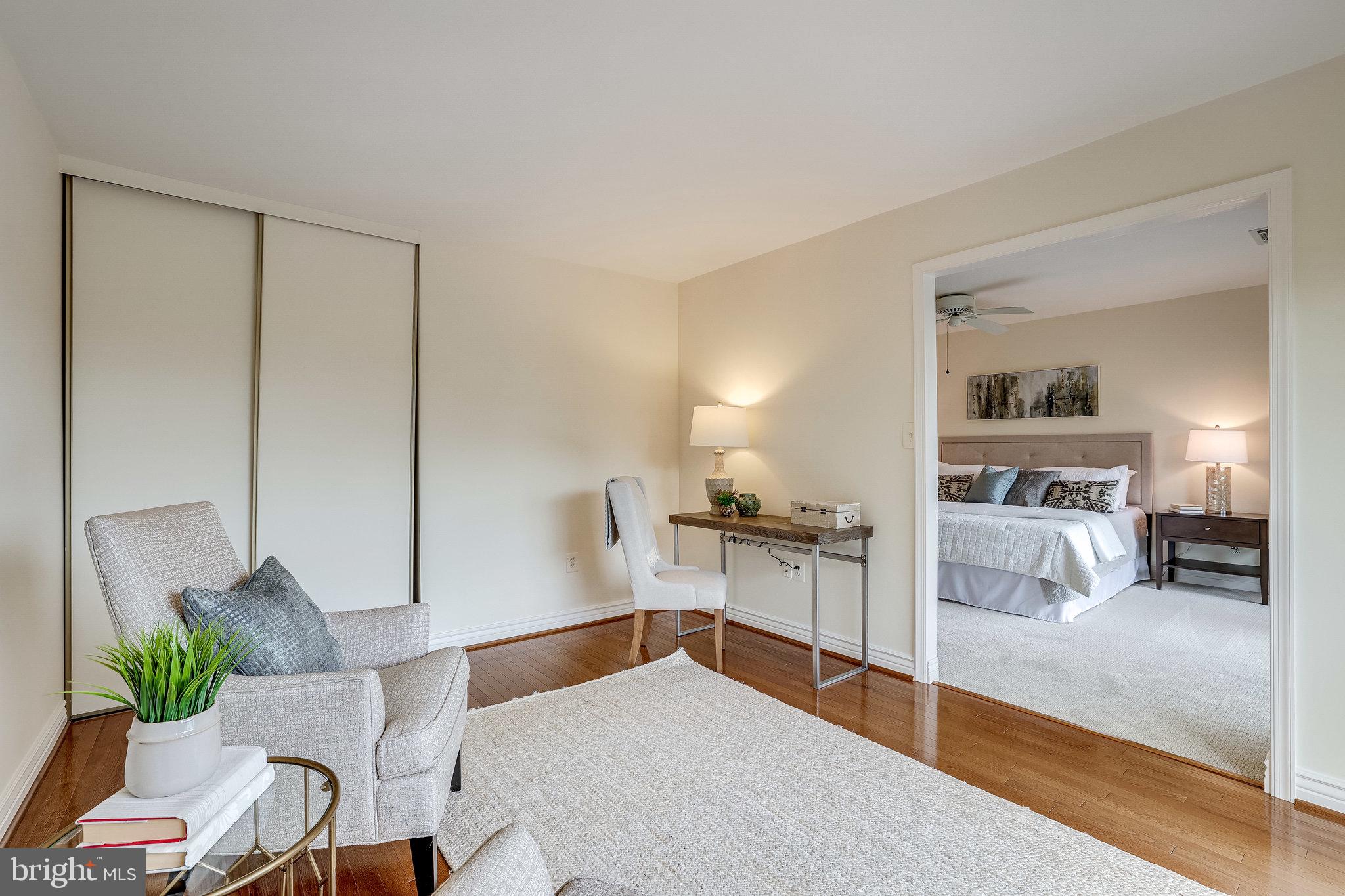 2024 Lakebreeze Way Reston, VA 20191 - Photo 45 of 95 a bedroom with a bed and a couch