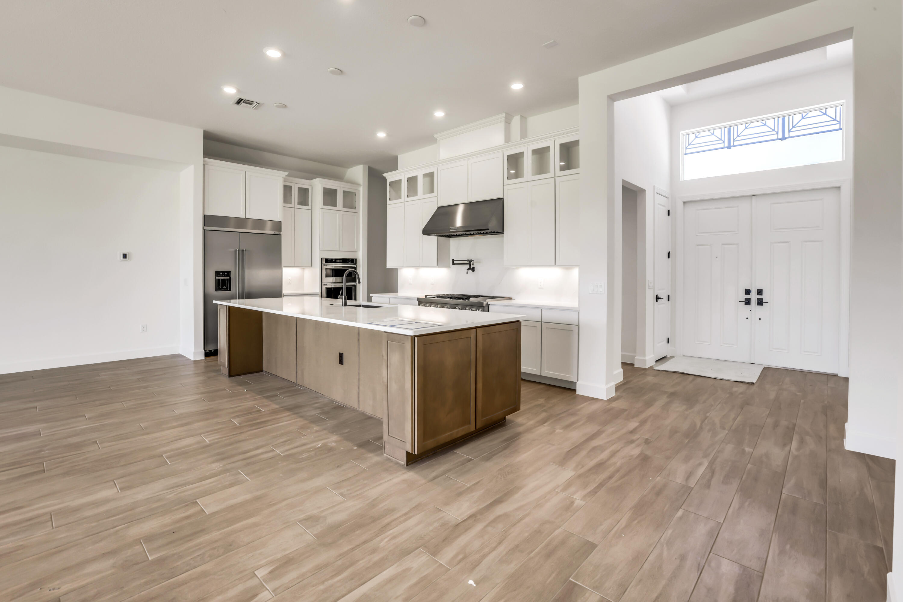 20161 Southeast Bridgewater Drive Jupiter, FL 33458 - Photo 14 of 50 a large kitchen with stainless steel appliances granite countertop a stove and a refrigerator