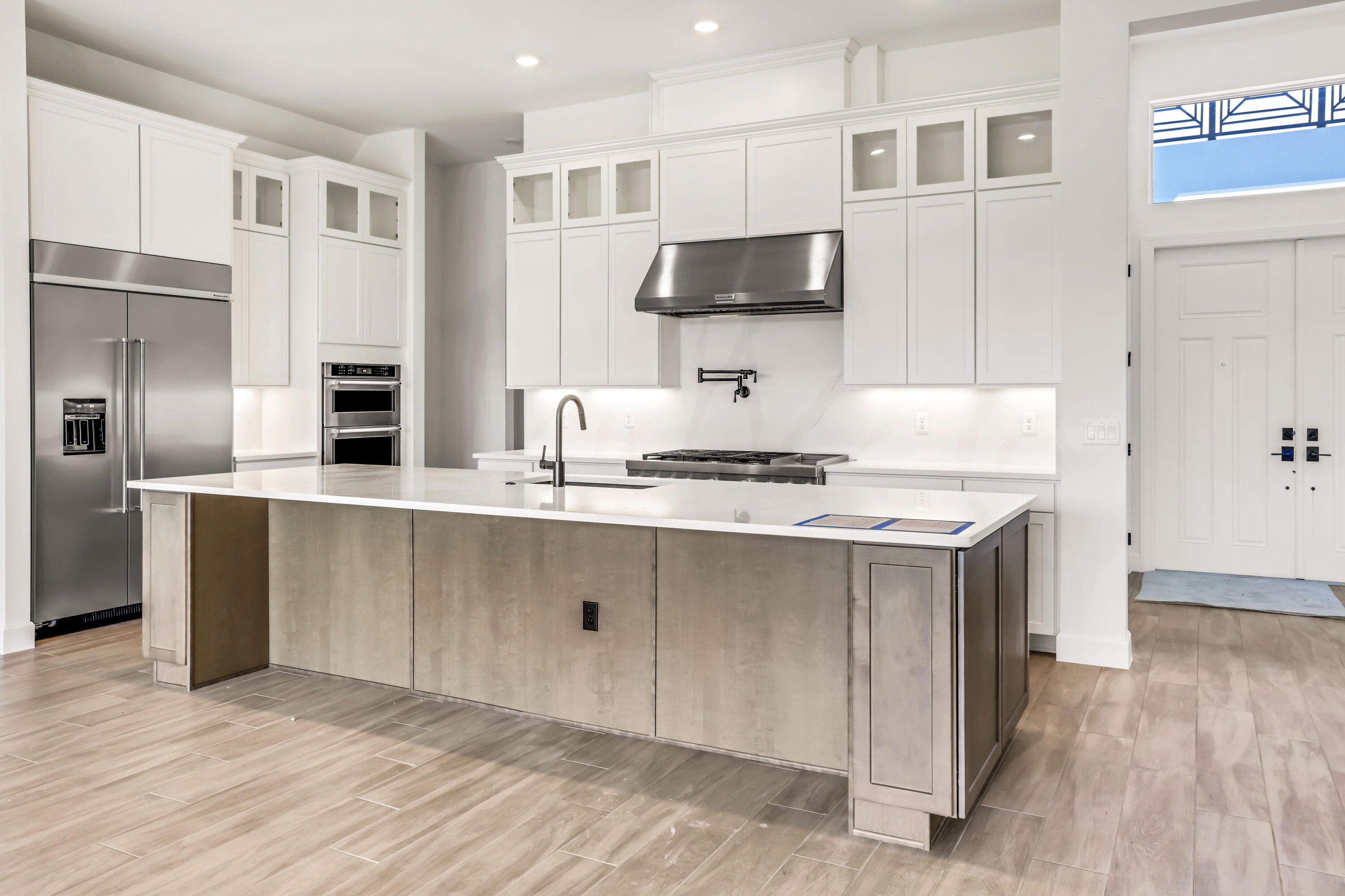 20161 Southeast Bridgewater Drive Jupiter, FL 33458 - Photo 16 of 50 a kitchen with stainless steel appliances a stove a sink and a refrigerator