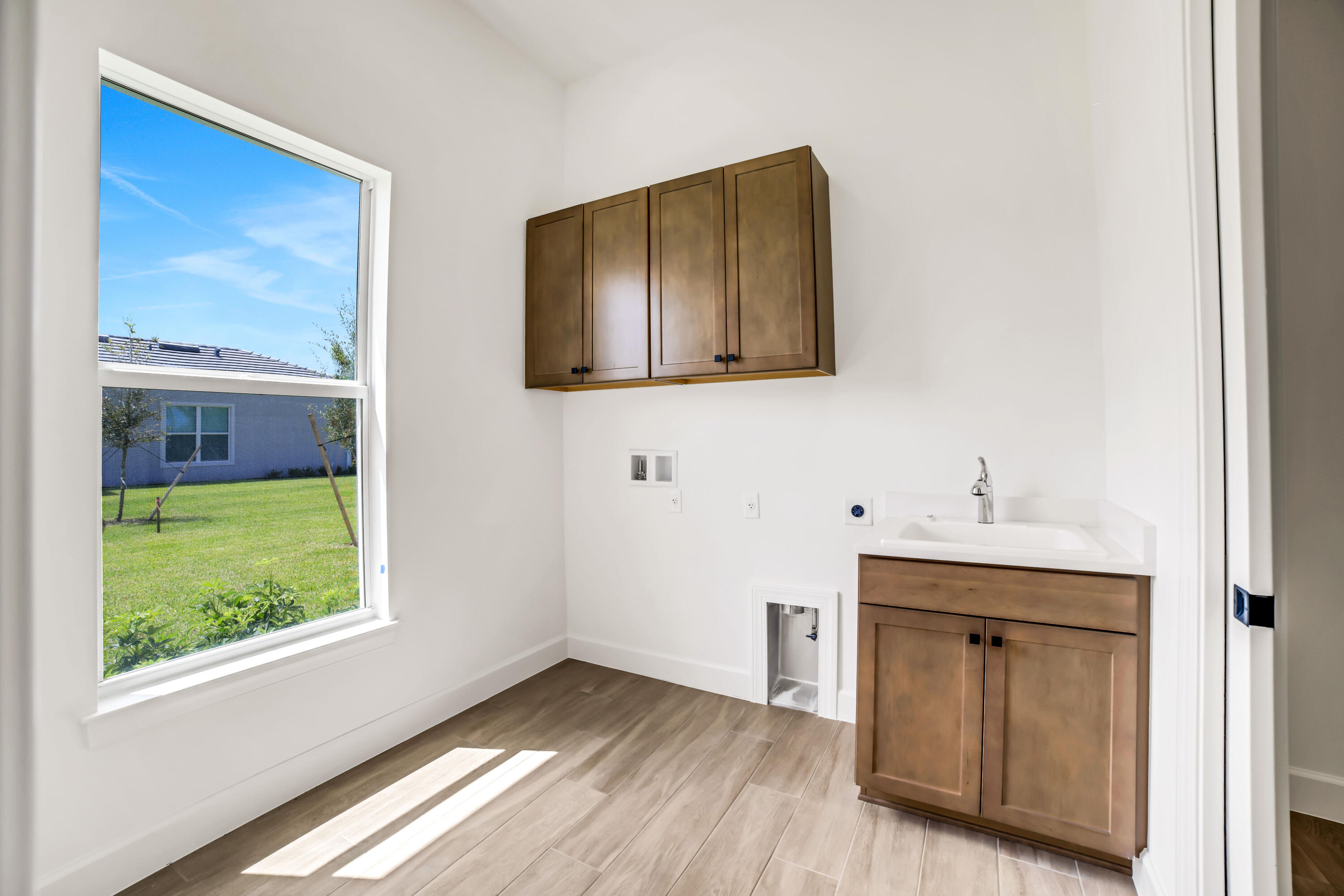 20161 Southeast Bridgewater Drive Jupiter, FL 33458 - Photo 23 of 50 a bathroom with a sink and a mirror