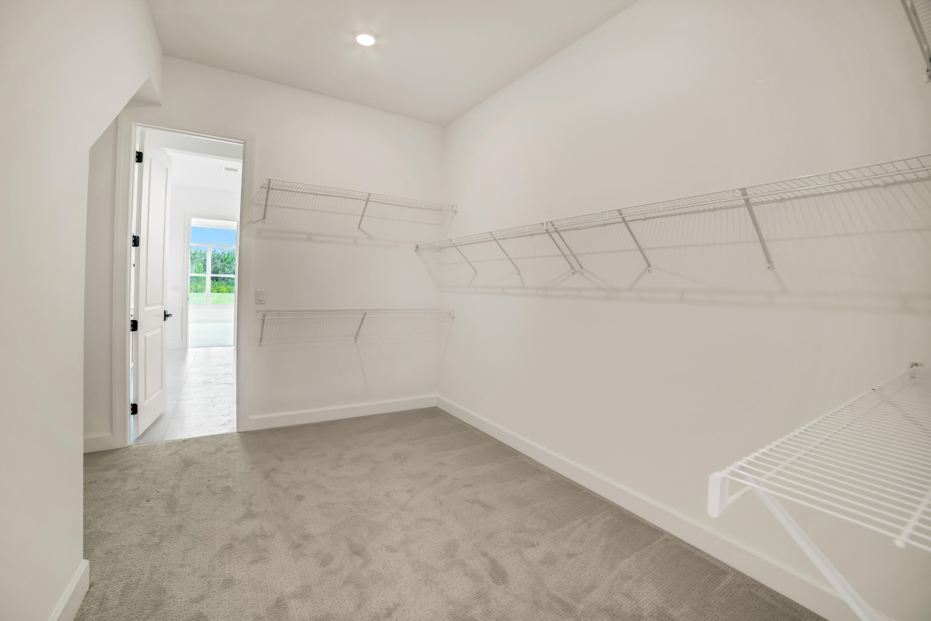 20161 Southeast Bridgewater Drive Jupiter, FL 33458 - Photo 24 of 50 an empty room with white walls