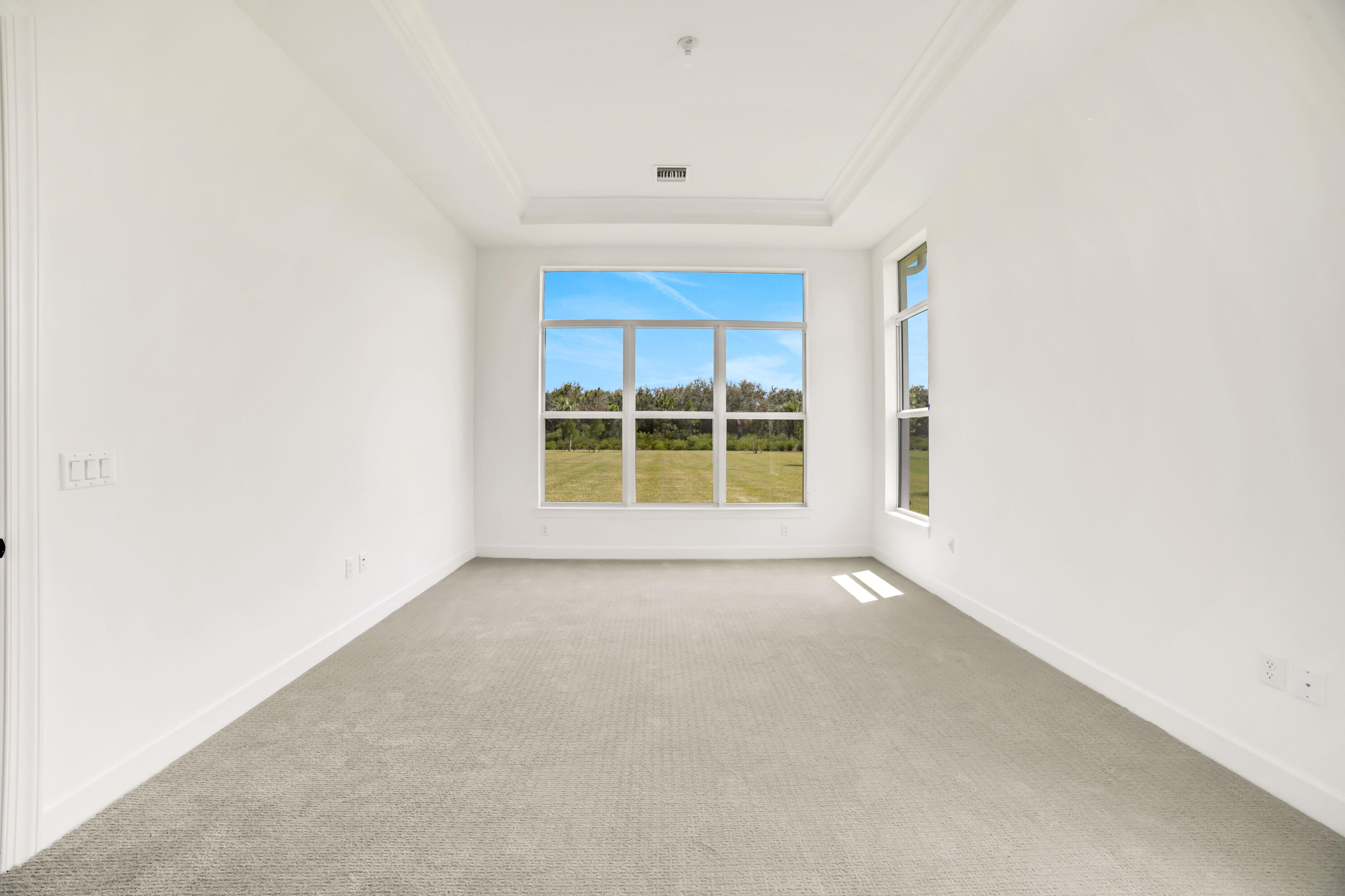 20161 Southeast Bridgewater Drive Jupiter, FL 33458 - Photo 25 of 50 a view of an empty room with a window