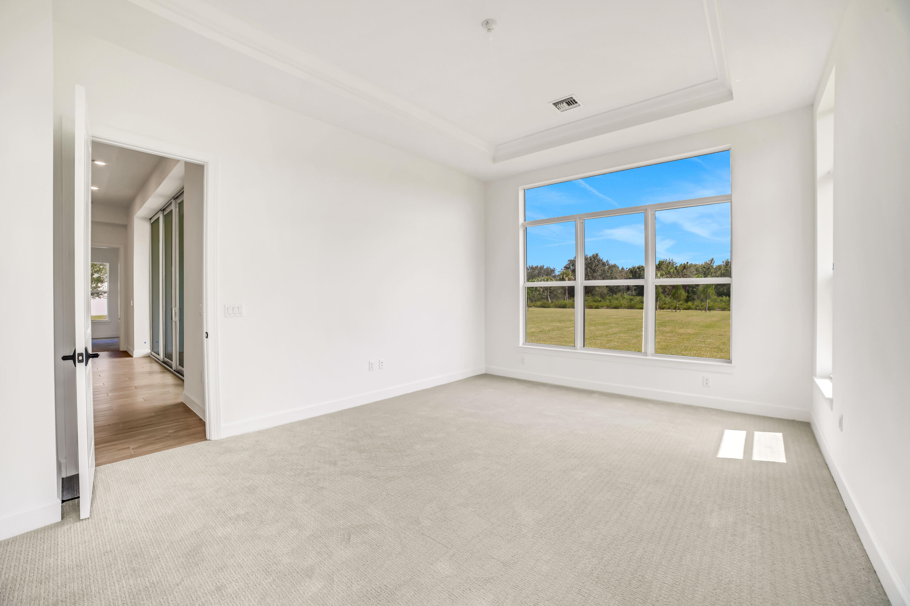 20161 Southeast Bridgewater Drive Jupiter, FL 33458 - Photo 26 of 50 a view of an empty room with a window