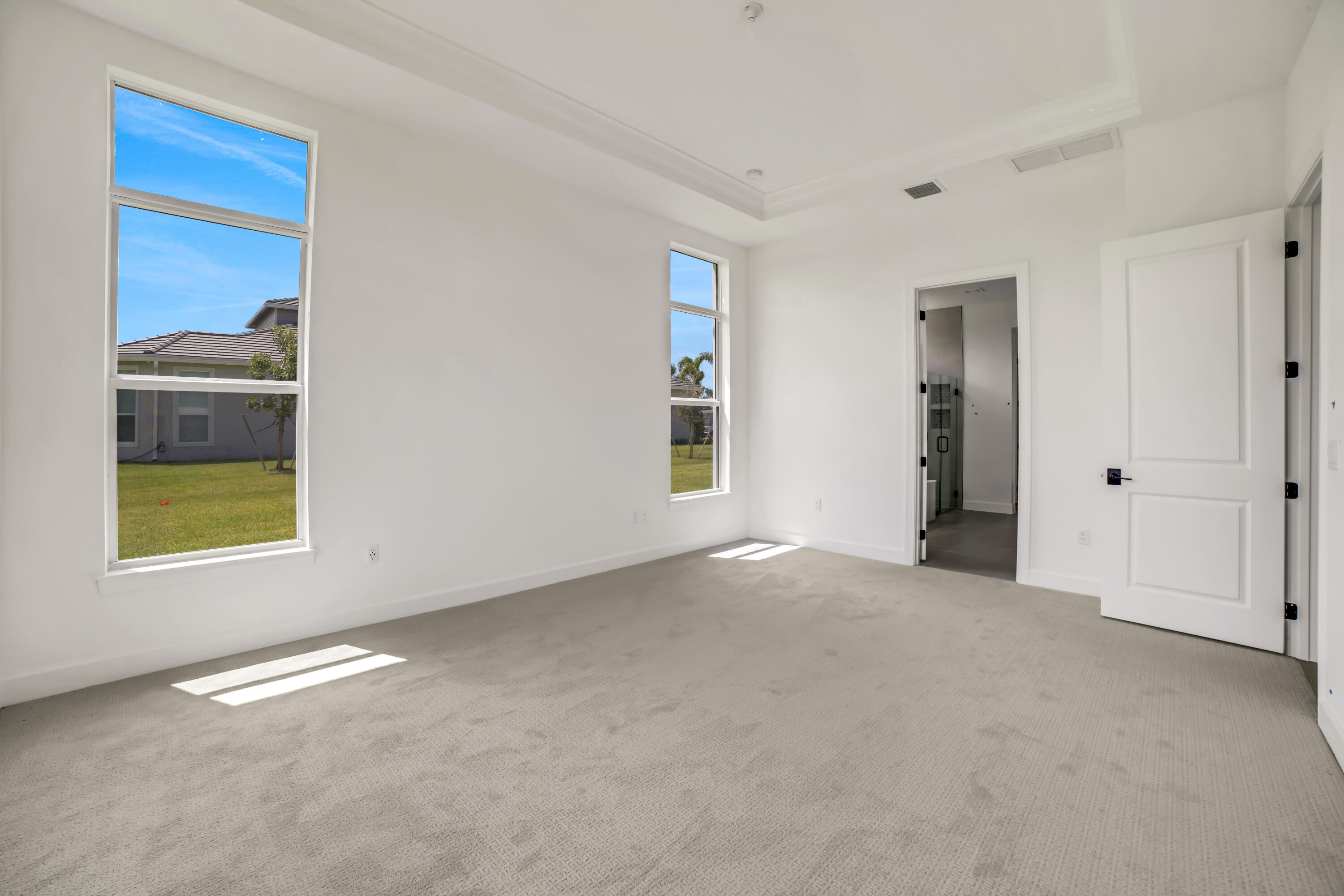20161 Southeast Bridgewater Drive Jupiter, FL 33458 - Photo 31 of 50 a view of an empty room with a window and cabinet