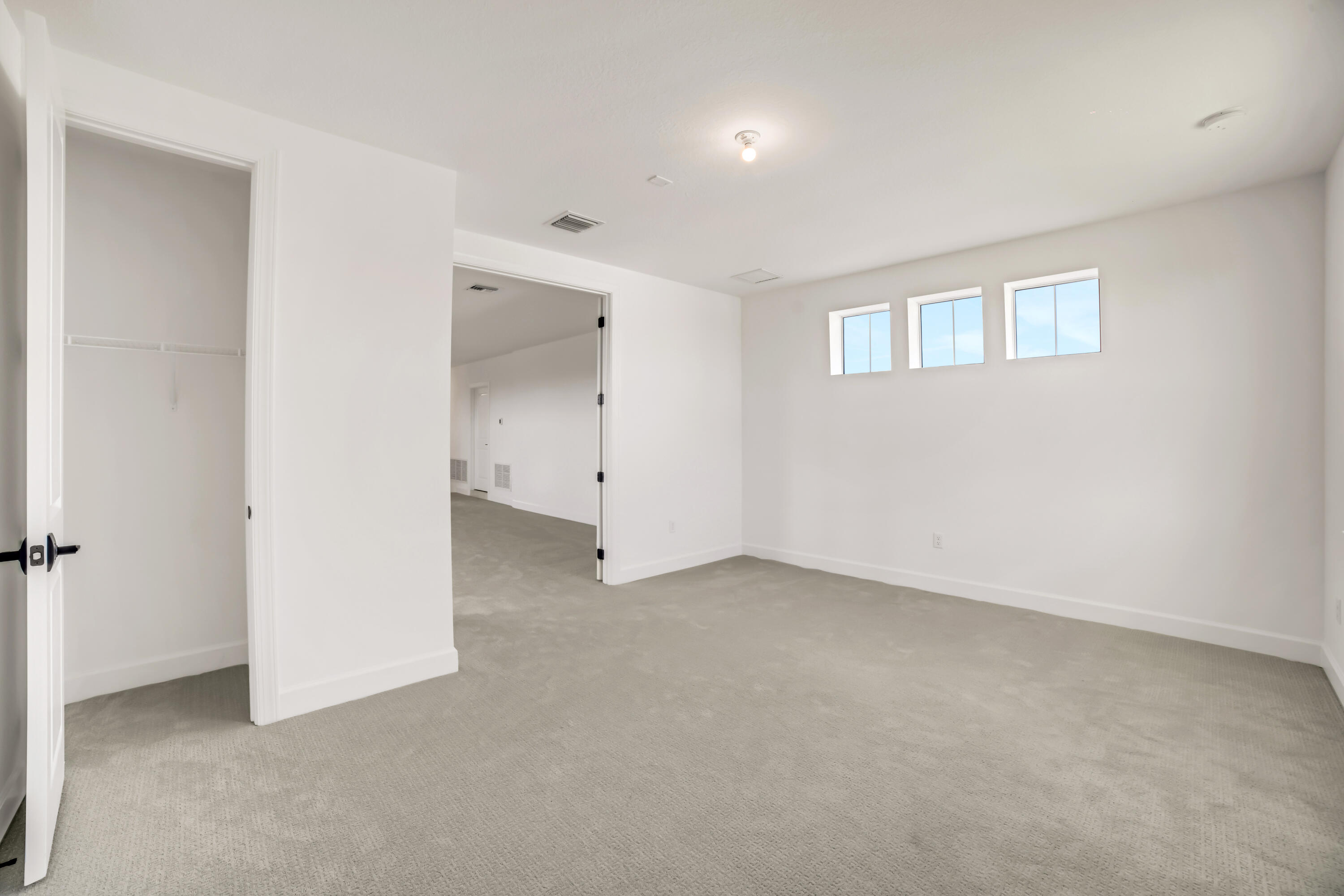 20161 Southeast Bridgewater Drive Jupiter, FL 33458 - Photo 41 of 50 an empty room with a natural light
