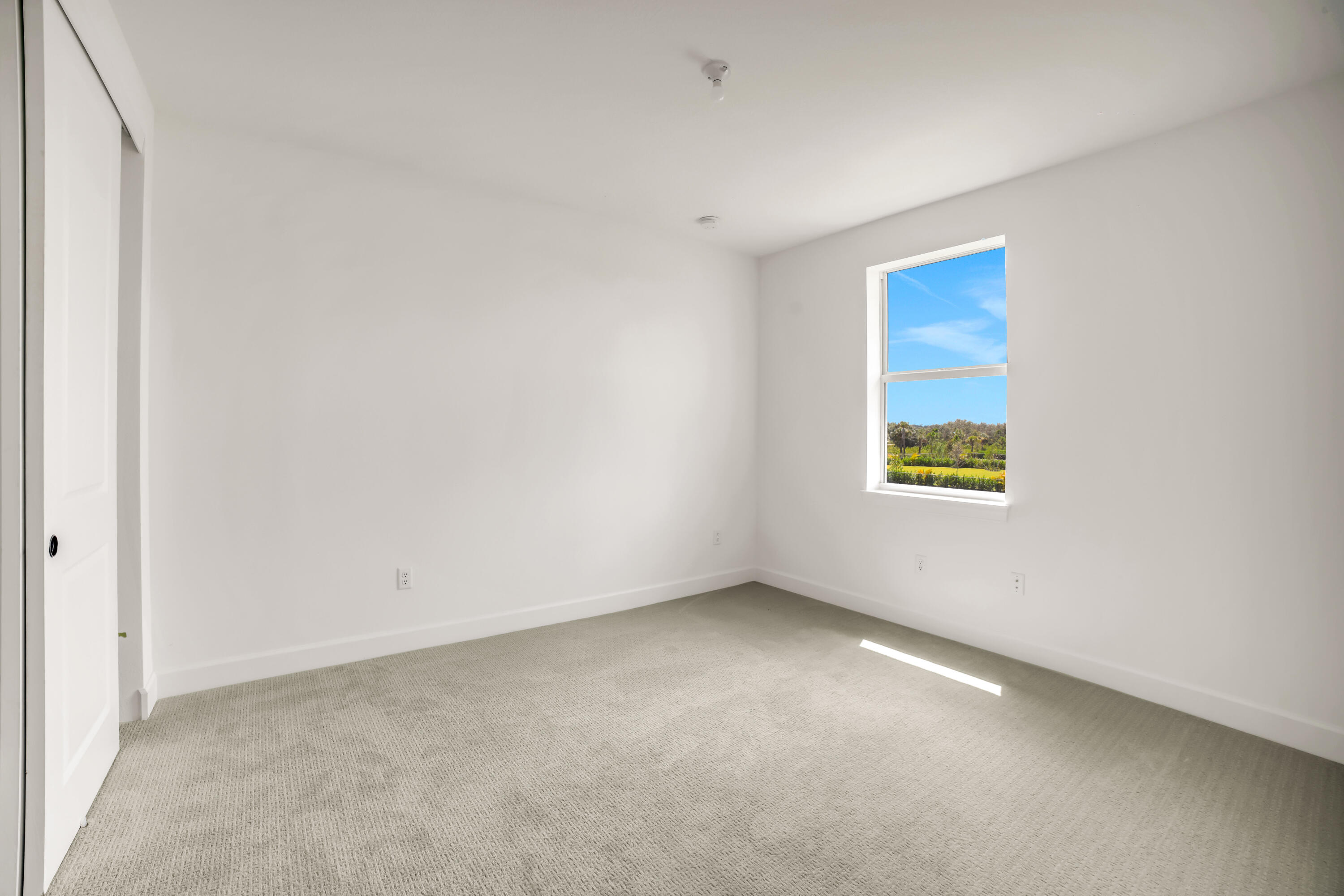 20161 Southeast Bridgewater Drive Jupiter, FL 33458 - Photo 42 of 50 an empty room with a window