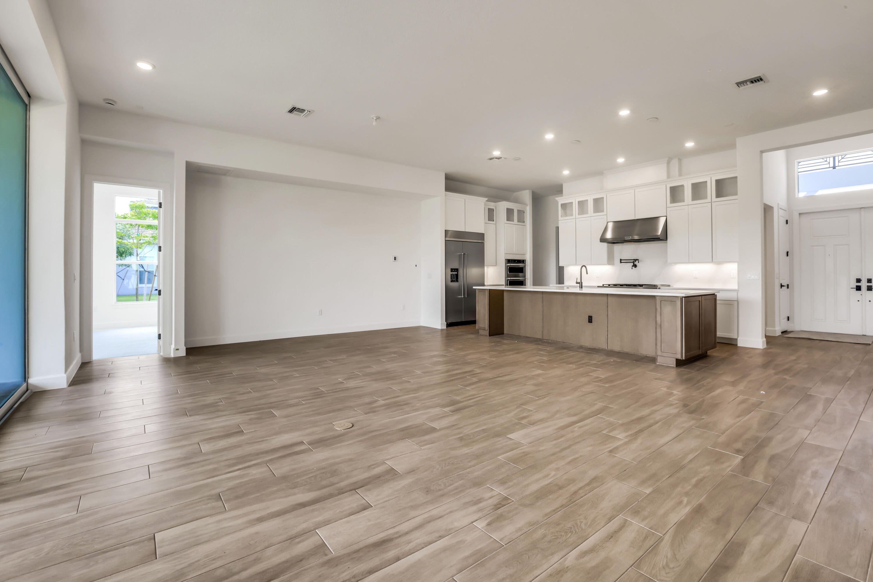 20161 Southeast Bridgewater Drive Jupiter, FL 33458 - Photo 10 of 50 a large kitchen with a lot of counter space and stainless steel appliances