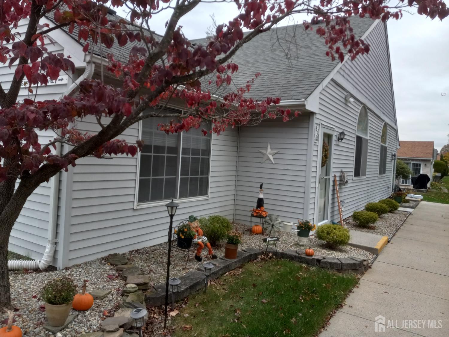 a backyard of a house with seating space