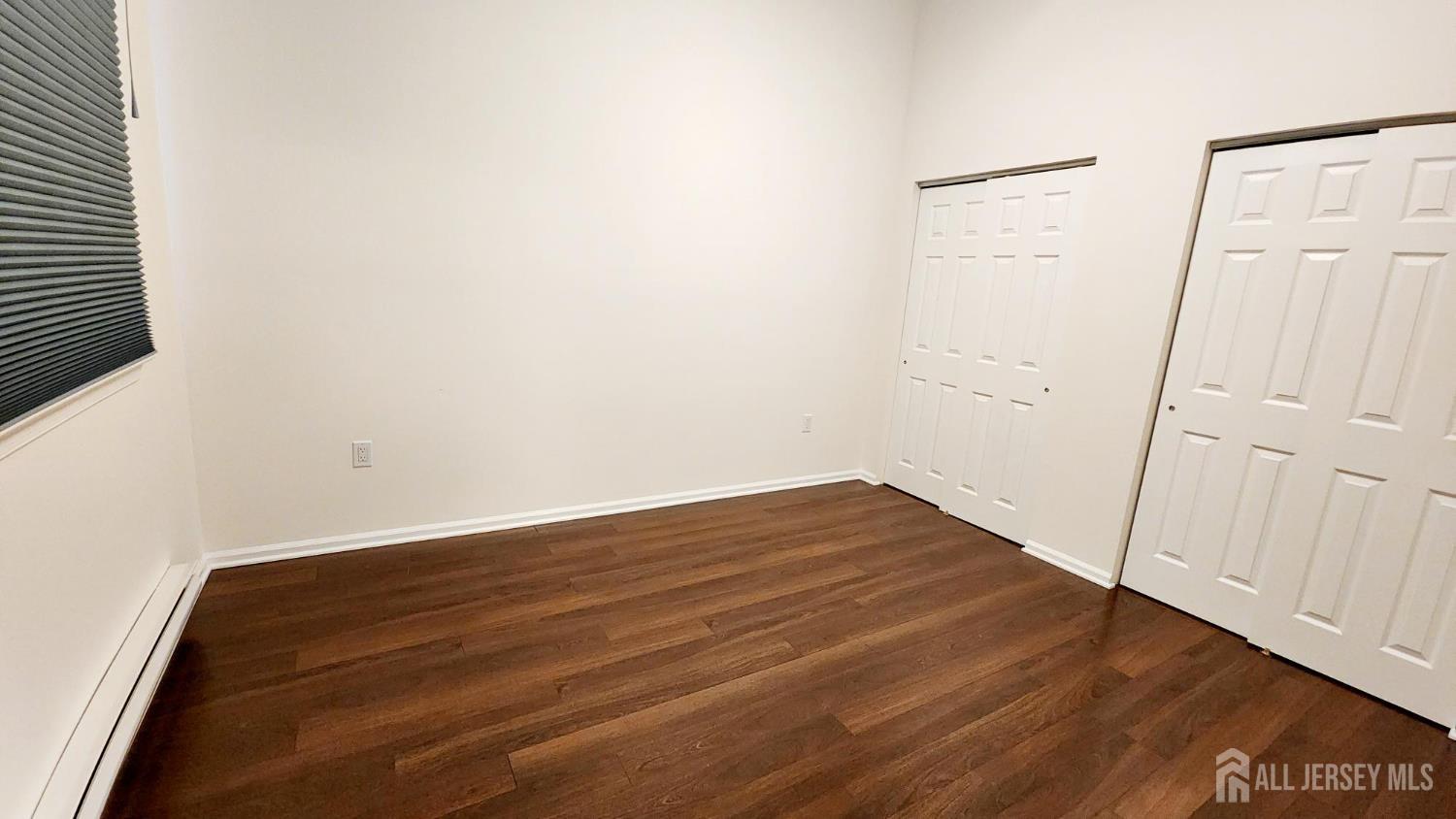 838 Vail Road, Unit A Monroe Township, NJ 08831 - Photo 21 of 34 a view of a room with wooden floor