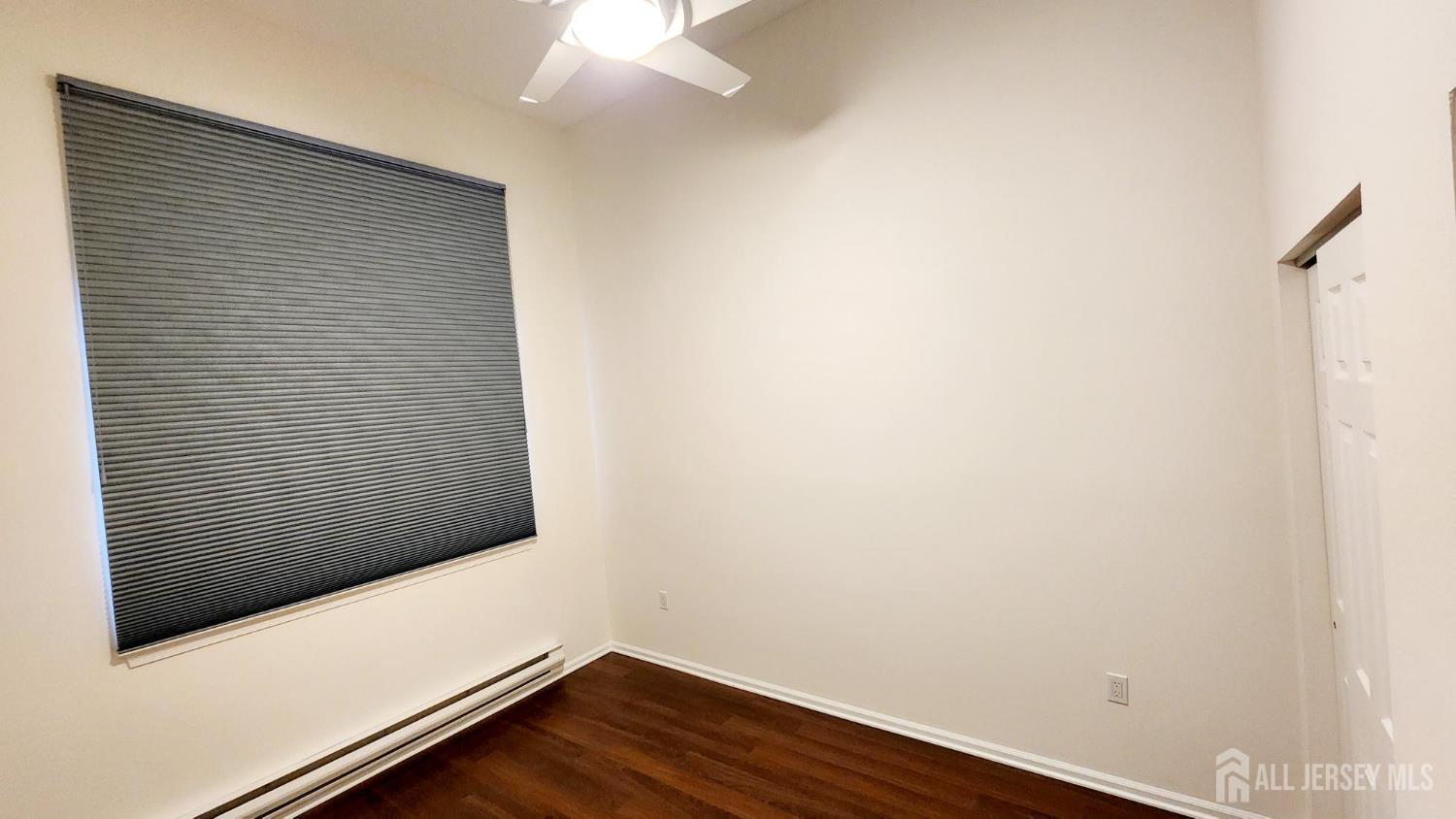 838 Vail Road, Unit A Monroe Township, NJ 08831 - Photo 23 of 34 a view of wooden floor with a window
