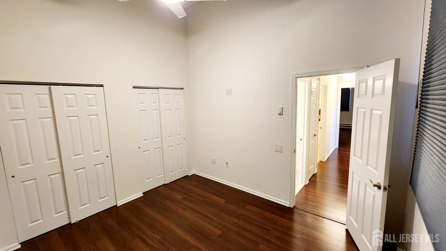838 Vail Road, Unit A Monroe Township, NJ 08831 - Photo 24 of 34 wooden floor in an empty room