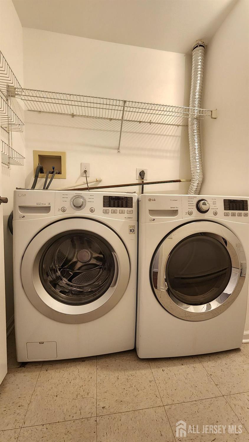 838 Vail Road, Unit A Monroe Township, NJ 08831 - Photo 30 of 34 a utility room with dryer and washer