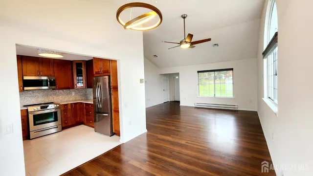 a view of a kitchen from the hallway