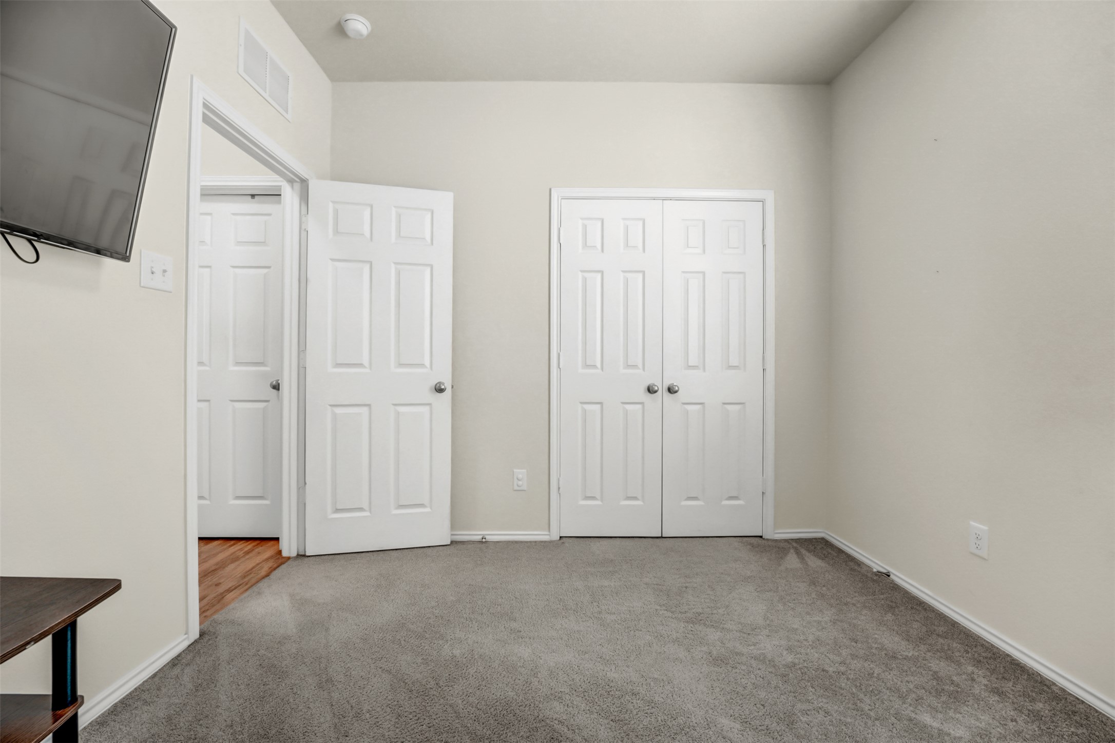 213 Ibis Falls Loop Jarrell, TX 76537 - Photo 22 of 37 A well-maintained interior offers practical closet space and durable carpeting, ready for personalization.