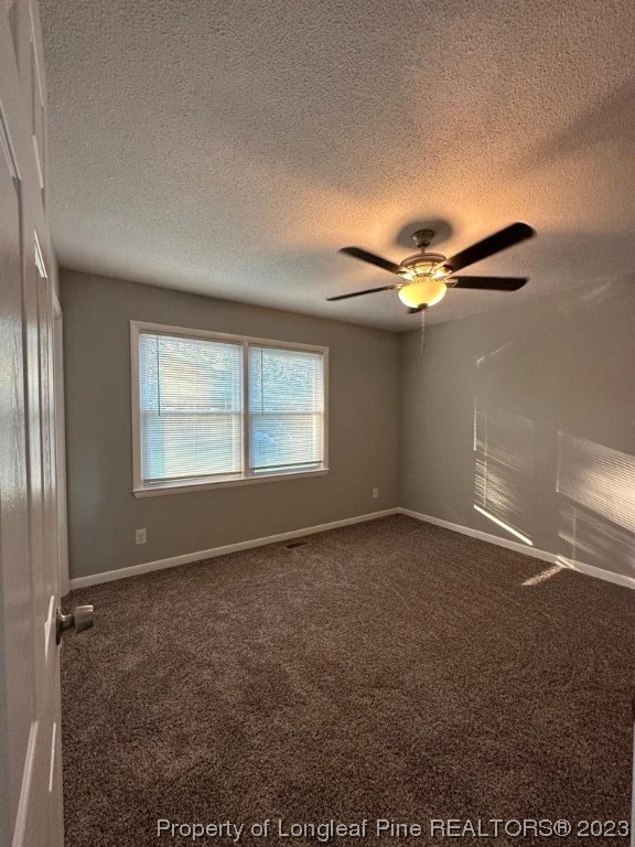 4553 Ruby Road Fayetteville, NC 28311 - Photo 11 of 19 a view of an empty room with a window
