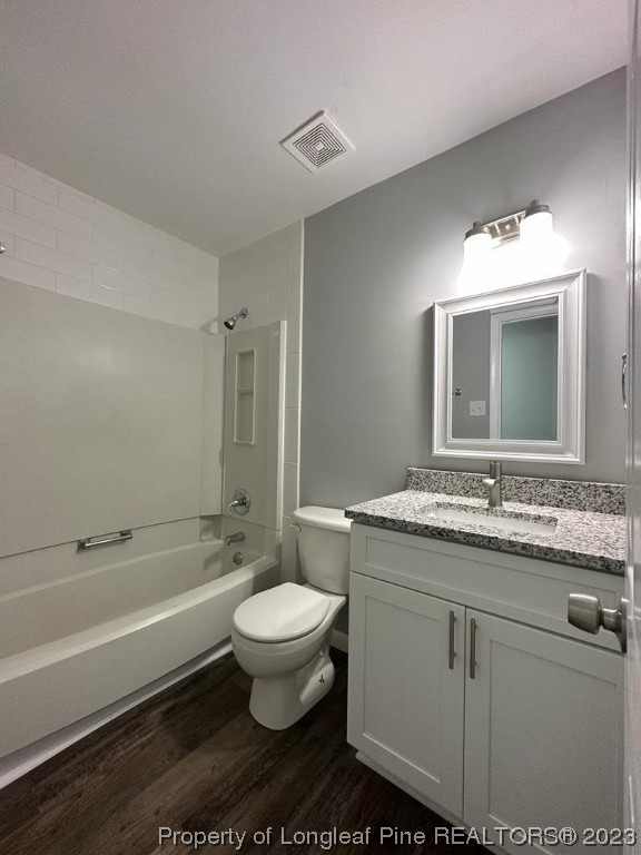 4553 Ruby Road Fayetteville, NC 28311 - Photo 13 of 19 a bathroom with a granite countertop sink toilet mirror and bathtub