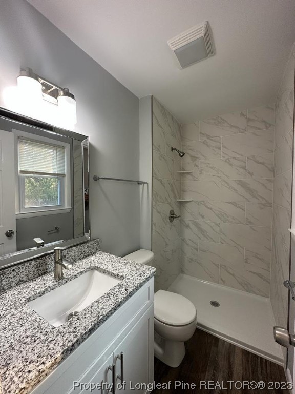4553 Ruby Road Fayetteville, NC 28311 - Photo 4 of 19 a bathroom with a granite countertop sink toilet and shower
