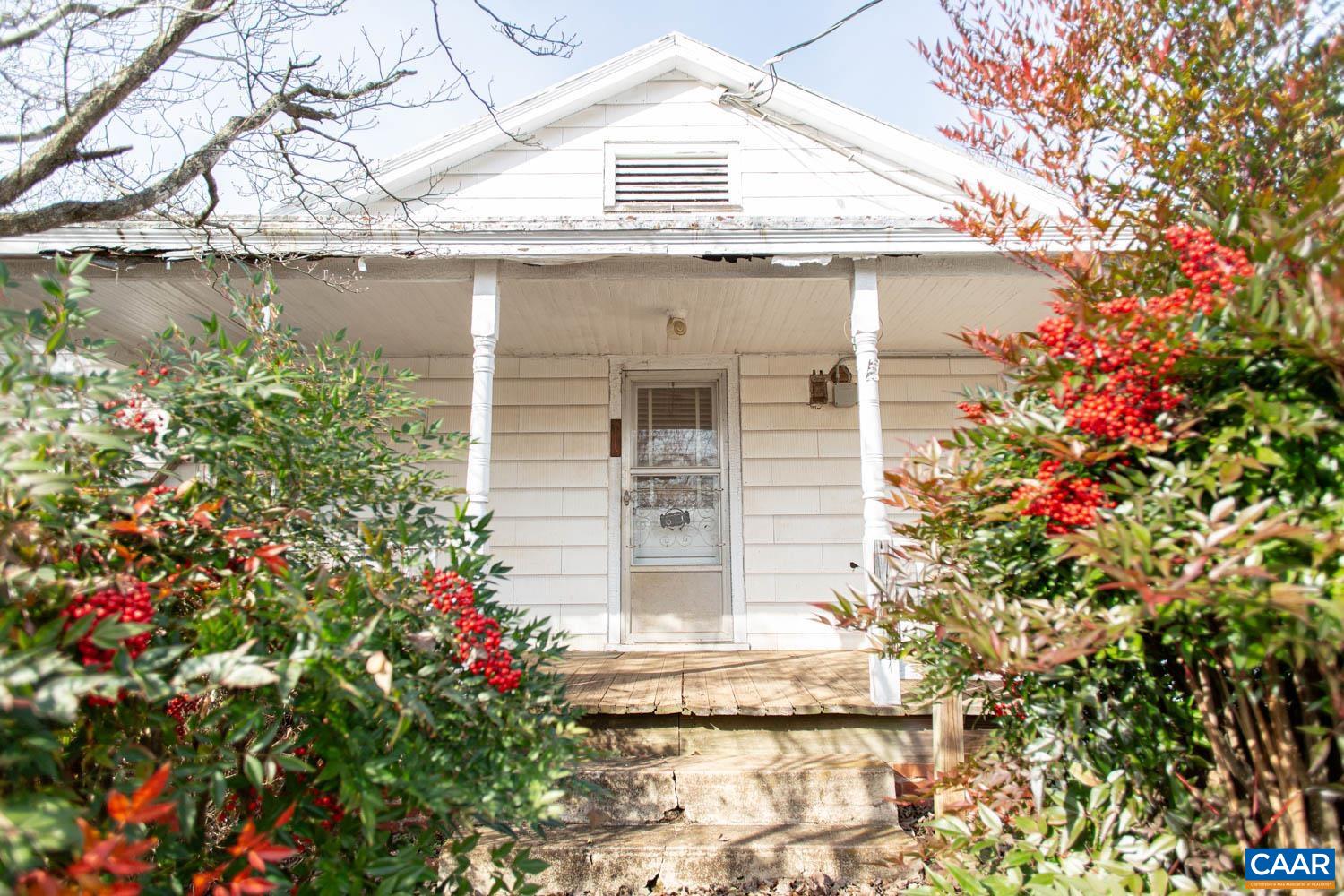611 Rives Street Charlottesville, VA 22902 - Photo 18 of 18 a front view of a house with a garden
