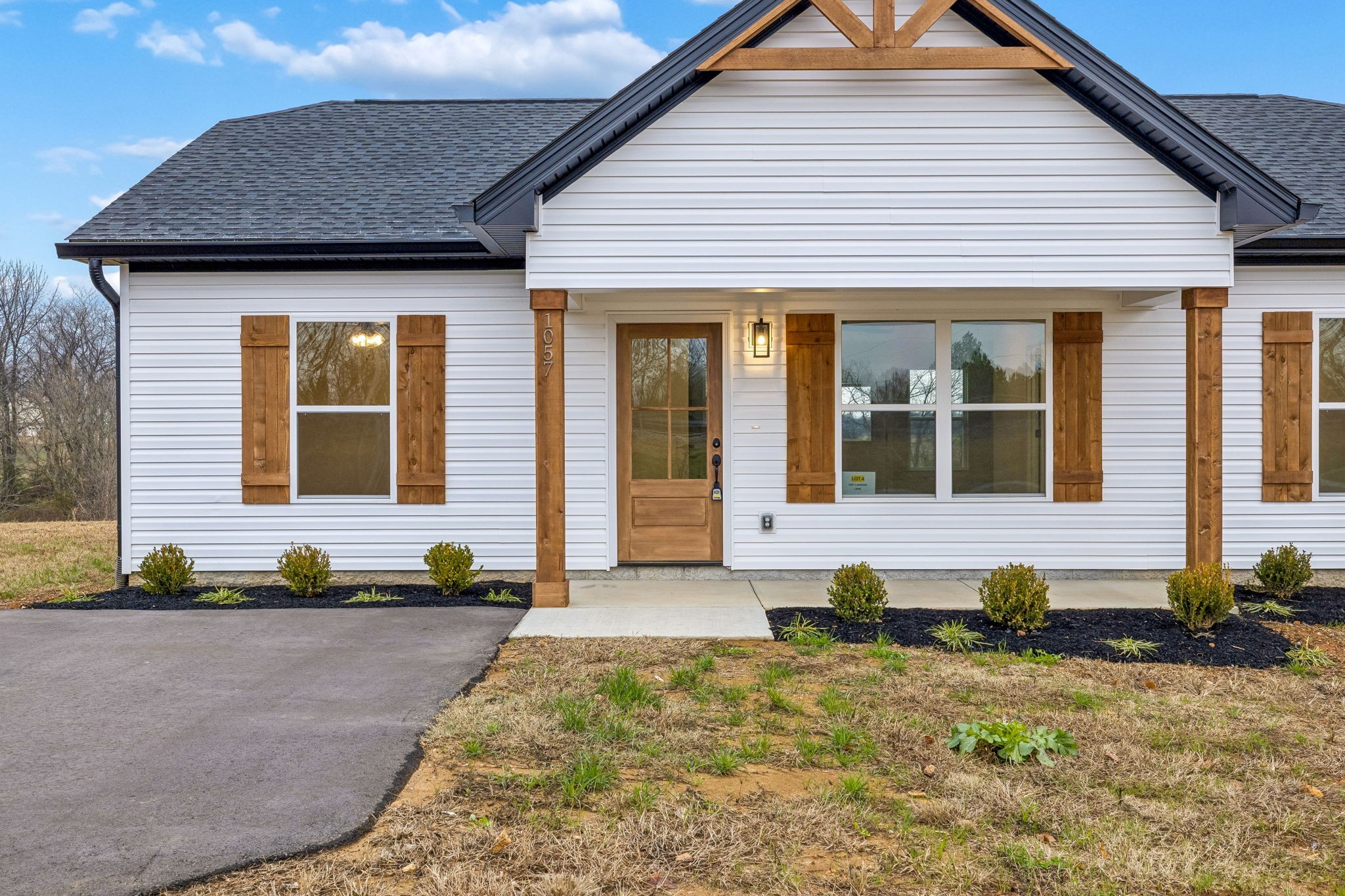 1057 Landing Lane Adams, TN 37010 - Photo 2 of 29 a front view of a house