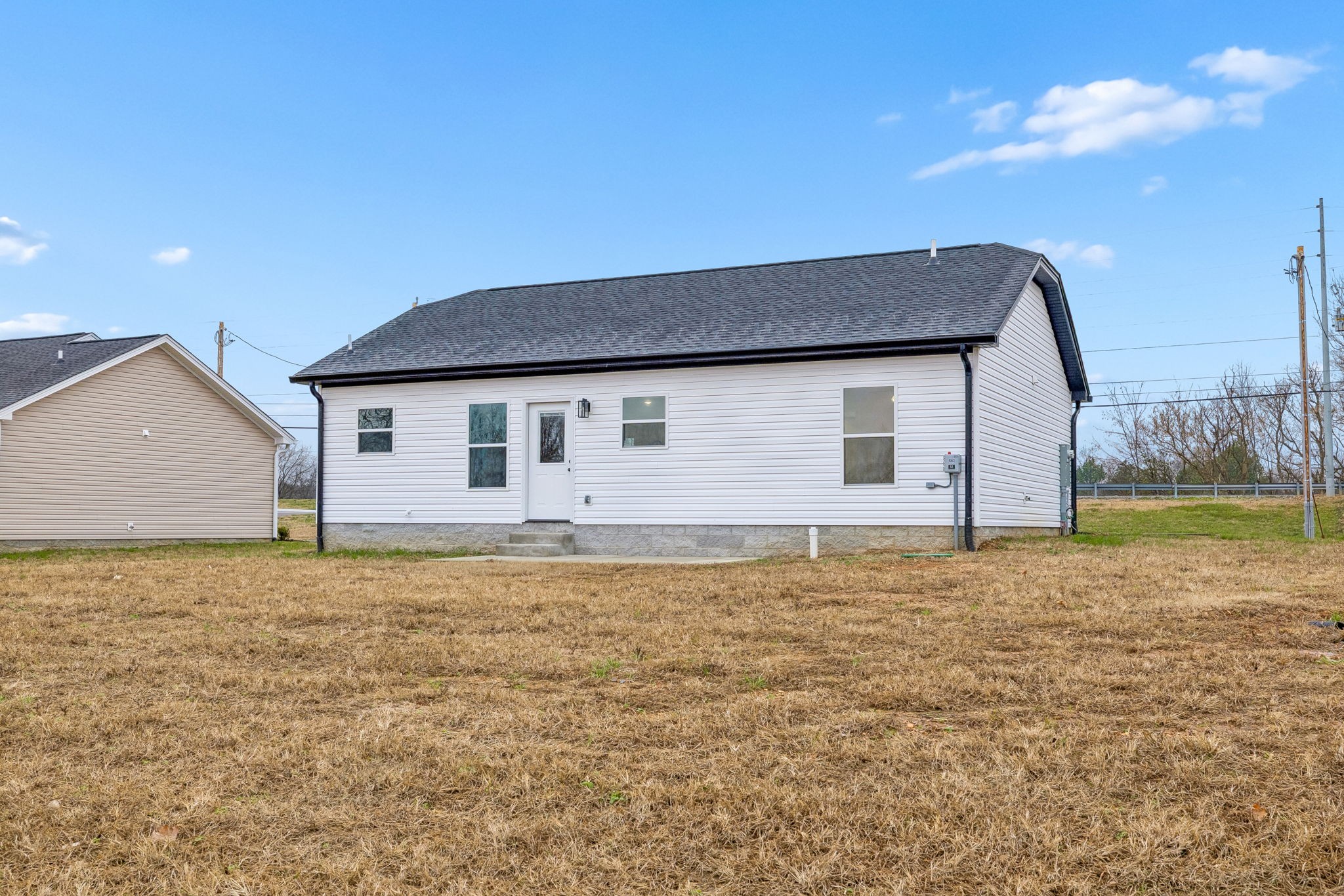 1057 Landing Lane Adams, TN 37010 - Photo 24 of 29 a house view with a outdoor space