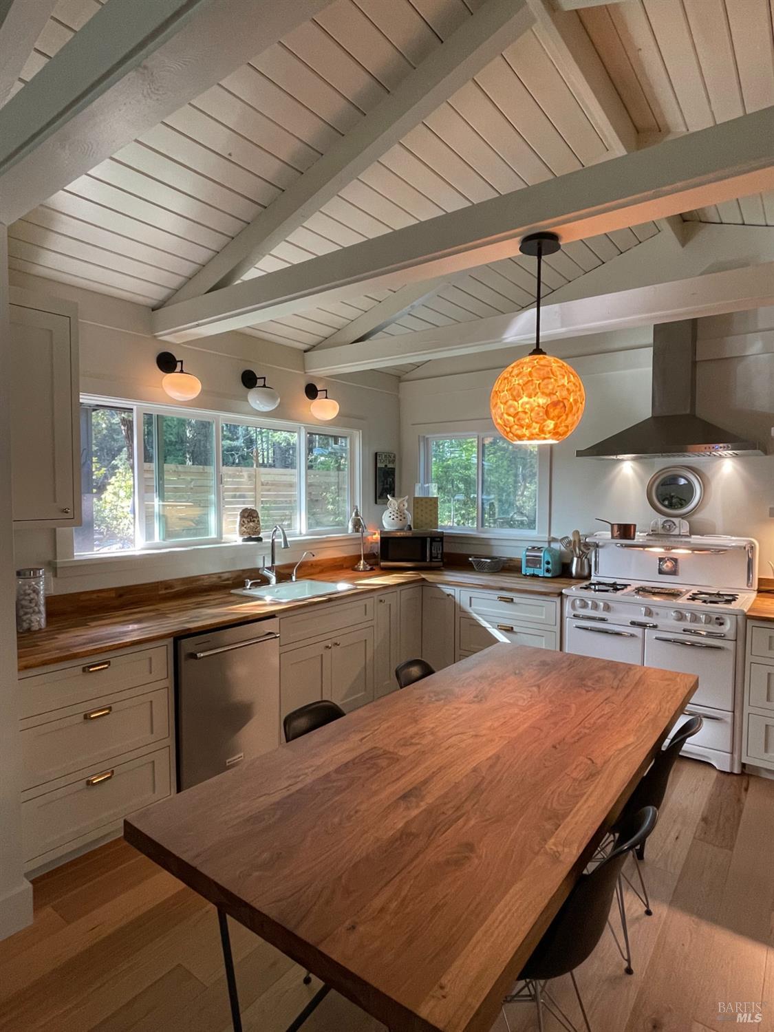 28800 Seaview Road Cazadero, CA 95421 - Photo 4 of 14 a large kitchen with a table and chairs