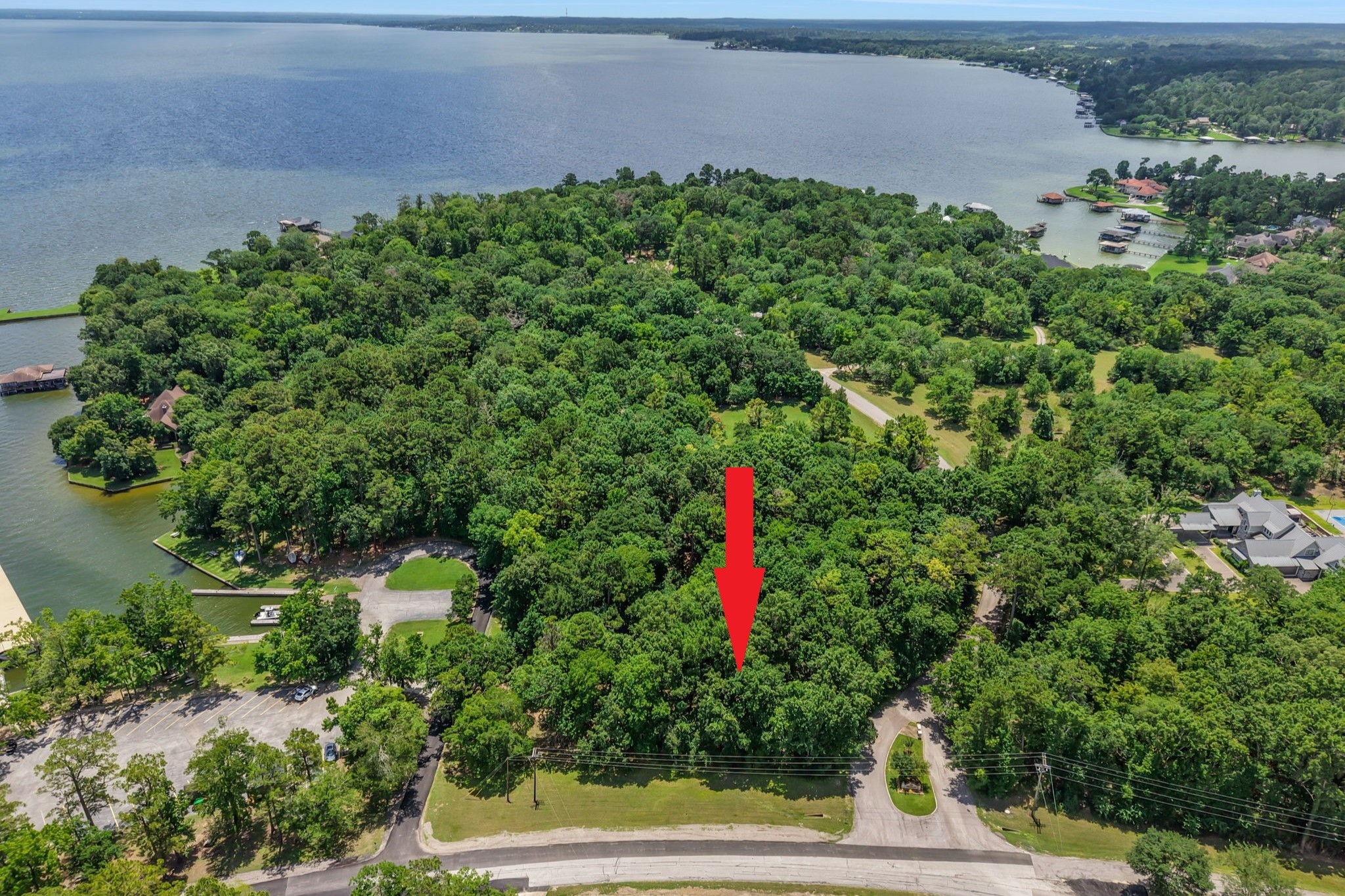 Tbd Ridge Lane Coldspring, TX 77331 - Photo 7 of 18 Situated on a corner lot near Cape Royale marina, putting Lake Livingston adventures within easy reach