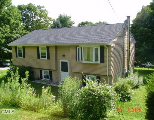 18 Dean Road New Milford, CT 06776 - Photo 1 of 1 a view of a house with garden and plants