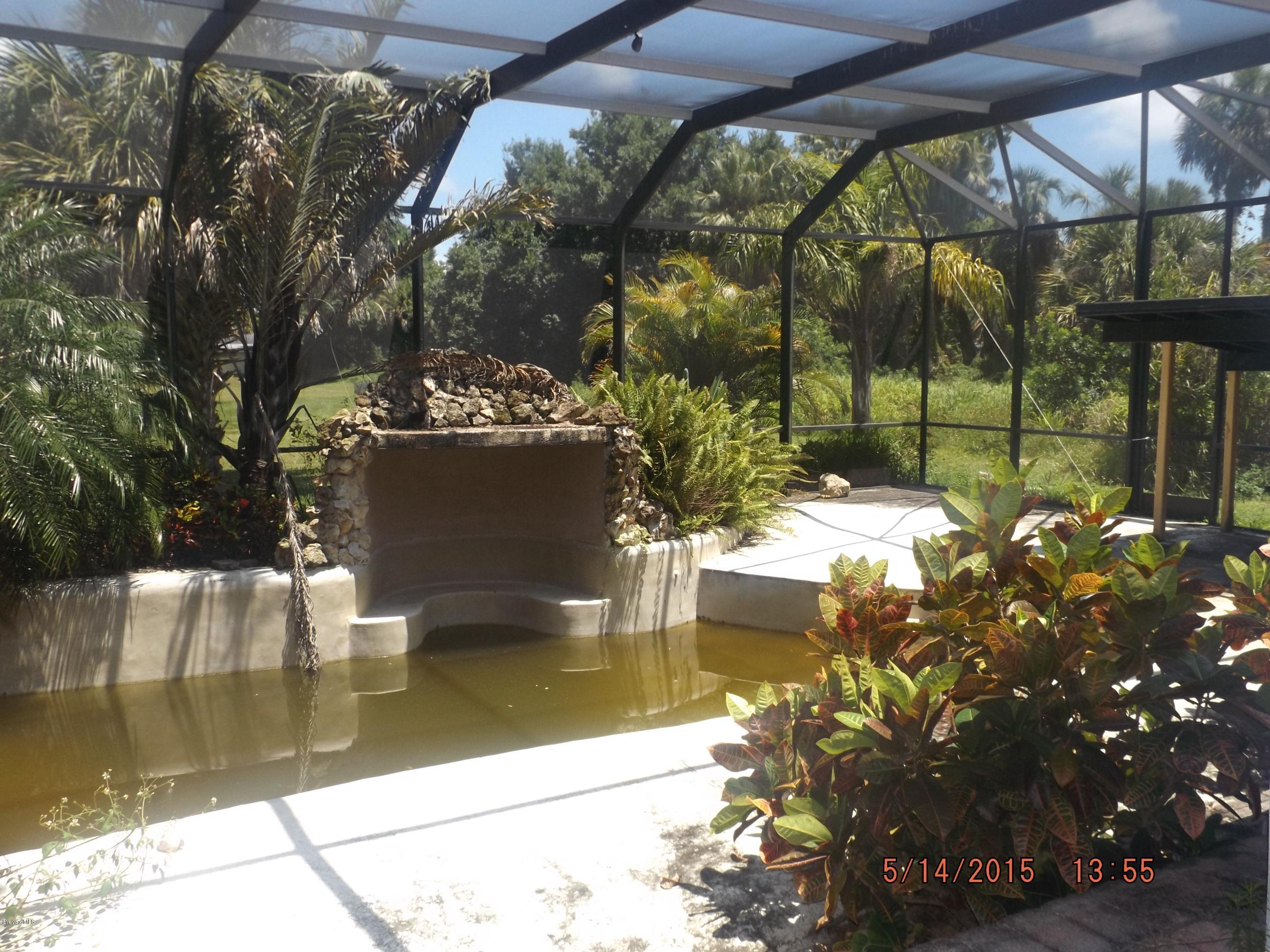 3201 Aurora Road Melbourne, FL 32934 - Photo 16 of 18 a view of swimming pool with a patio