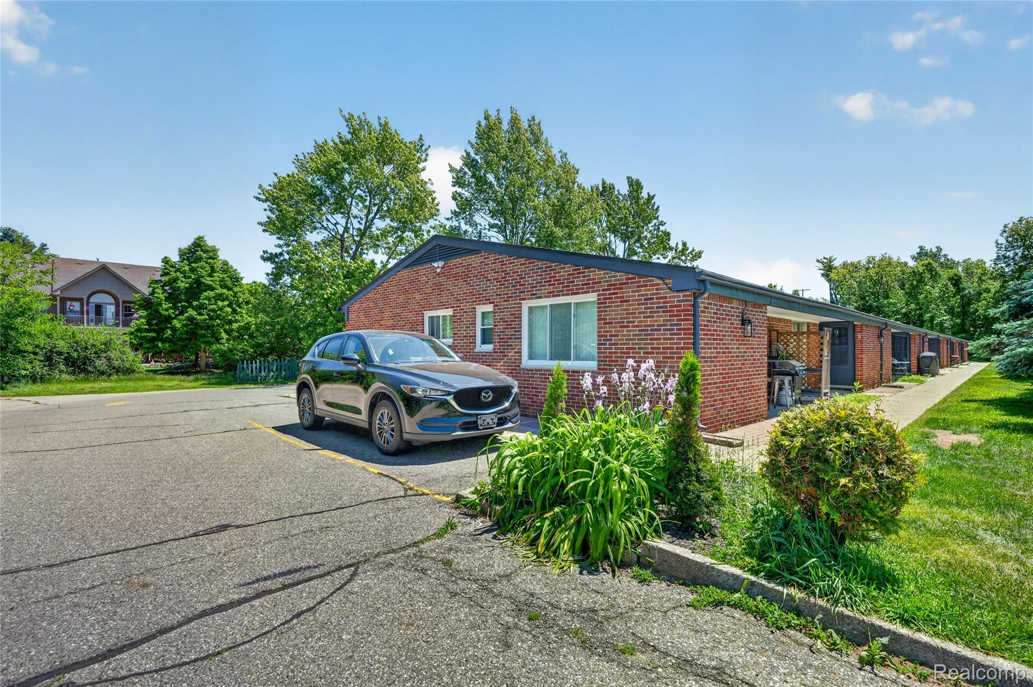 48770 Shelby Road, Unit 14 Utica, MI 48317 - Photo 18 of 18 22-48770-Shelby-Rd-Unit-8-WindowStill.jpg