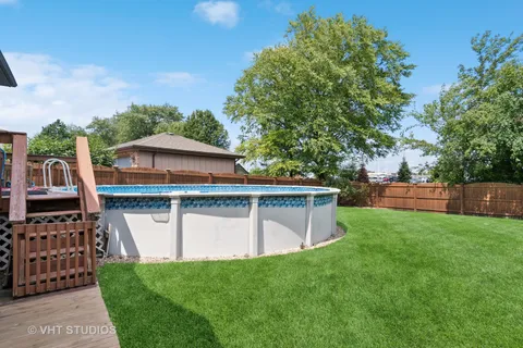 a view of a house with roof deck