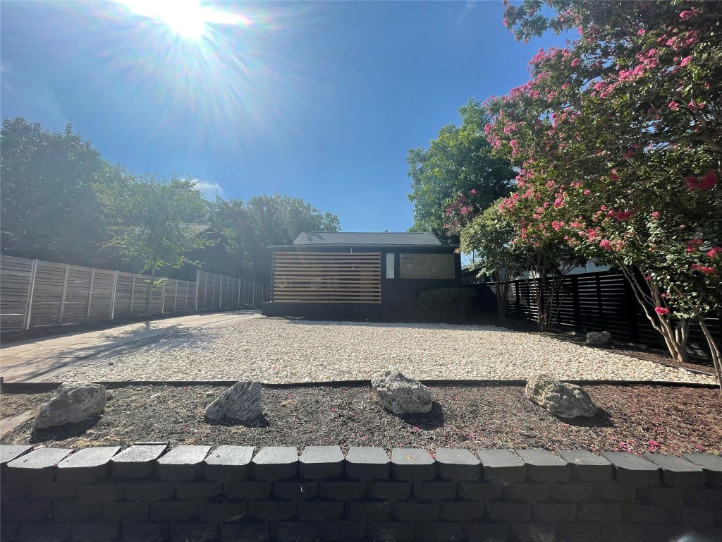 1403 Newfield Lane Austin, TX 78703 - Photo 2 of 34 a outdoor view of house with yard