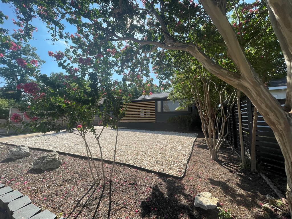 1403 Newfield Lane Austin, TX 78703 - Photo 3 of 34 a view of a house with a yard