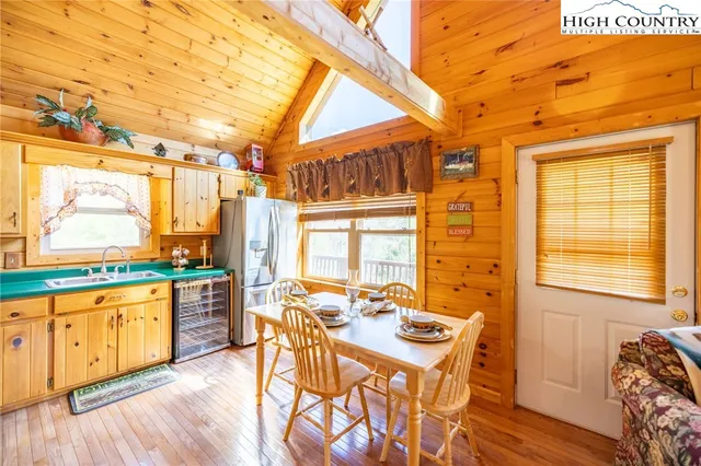 a view of a kitchen with a large window