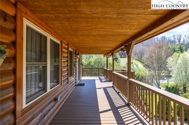 a view of a garden with a building in the background