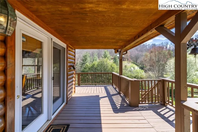 a view of balcony and yard