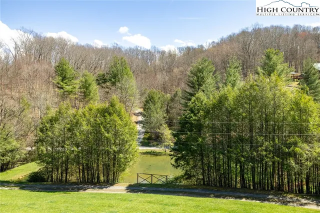 a view of two chairs on the roof deck