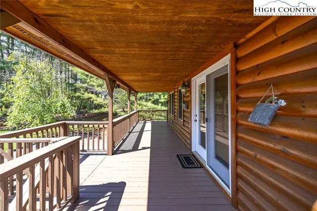 a view of balcony with furniture