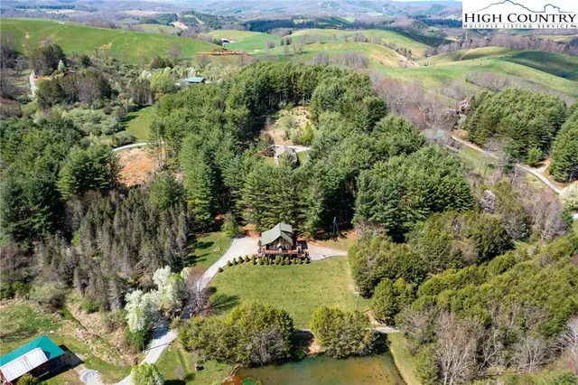 an aerial view of residential house with outdoor space