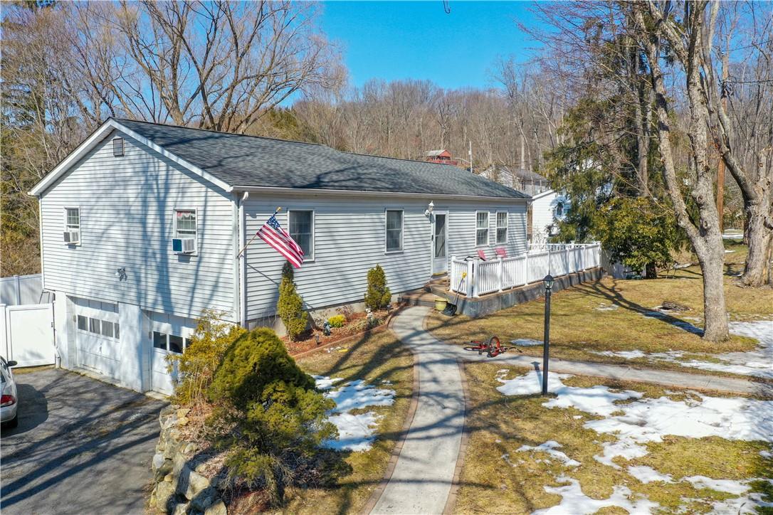 2 Ferndale Road Brewster, NY 10509 - Photo 1 of 1 a view of a house with snow on the road