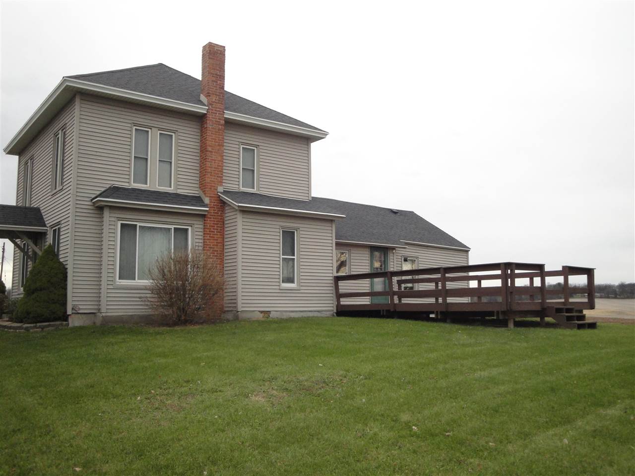 8005 Kishwaukee Road Stillman Valley, IL 61084 - Photo 3 of 12 a view of a house with a yard