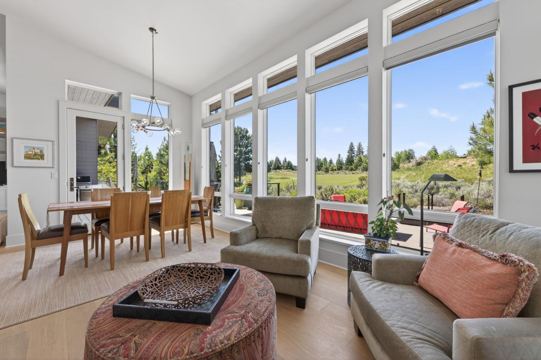 61487 Hackleman Court Bend, OR 97702 - Photo 17 of 35 a living room with furniture and a large window
