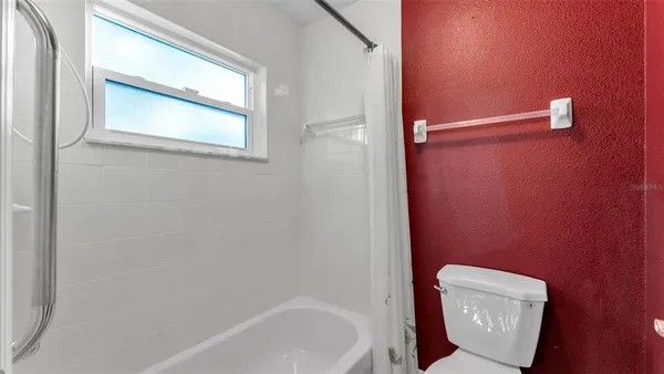a bathroom with a sink vanity and a mirror