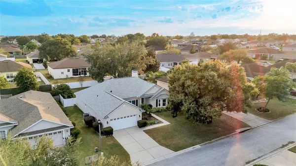 an aerial view of a house with a garden